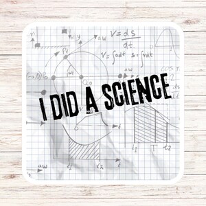 May include: A crumpled piece of graph paper with handwritten math equations and the text "I DID A SCIENCE" in bold black letters.