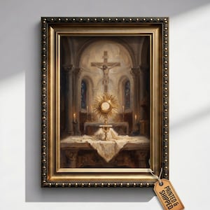 May include: A framed wall art print depicting a golden monstrance on an altar with a crucifix in the background. The ornate gold frame features a beaded edge. A small brown tag attached to the bottom right corner displays the text PRINTED & SHIPPED.