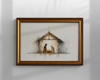 May include: Watercolor painting of a Nativity scene in a gold framed picture. The artwork depicts a stable with figures of Mary, Joseph, and baby Jesus. The painting has a warm, neutral color palette with a cross atop the stable.