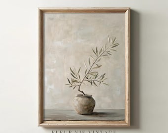May include: A framed painting of a single olive branch in a beige pot against a light beige background. The painting is titled "Fleur Vie Vintage Art Gallery".