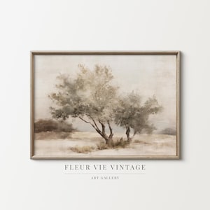 May include: A framed landscape art print featuring a muted color palette. The artwork depicts a pair of trees in a field, with soft, neutral tones dominating the scene. The text "FLEUR VIE VINTAGE ART GALLERY" is displayed at the bottom.
