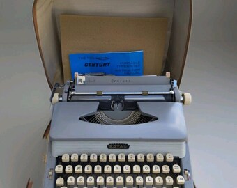 Royal Century Portable Typewriter – Mint Condition with Case and Manual