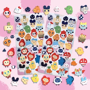 May include: A set of colorful stickers featuring various cartoon characters, including animals, food, and other whimsical designs. The stickers are arranged on a pink background.