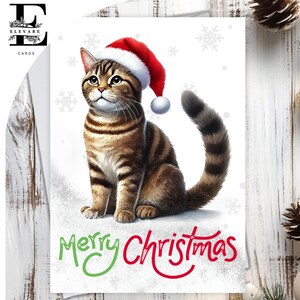 Chat tigré brun portant un chapeau de Noël. Joyeux Noël. Une carte de Noël amusante pour tous les amoureux des chats. Tous les âges, choisissez la personnalisation - A5, 6 x A6