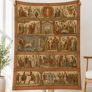May include: A rectangular woven tapestry blanket featuring a multi-paneled design with classical Greco-Roman scenes. The artwork depicts figures in ancient attire, horses, chariots, and architectural elements, all framed by a decorative Greek key border.