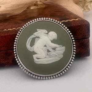 A Vintage Sterling Silver Pastel Green Wedgwood Jasperware Cameo Cupid Brooch. Chester 1957