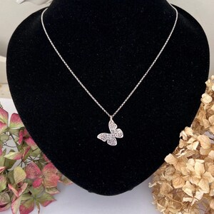 A Vintage Sterling Silver Dainty Butterfly Pendant and Chain Necklace. 20 Inches