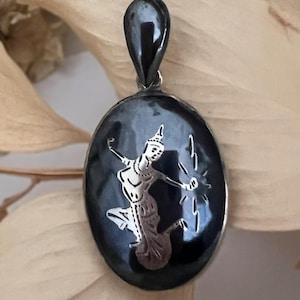 A Vintage Sterling Silver Niello Siamese Goddess Oval Puffy Pendant with Niello Bale.