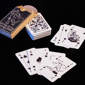 Spielkarten mit Linolmotiven