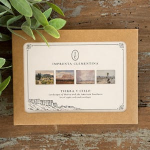May include: A rectangular brown cardboard box containing a set of eight cards and envelopes. The label features the text IMPRENTA CLEMENTINA, TIERRA Y CIELO, Landscapes of Mexico and the American Southwest, and four small landscape illustrations.