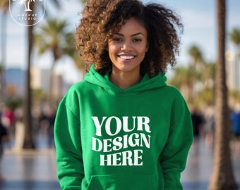 May include: A woman wearing a bright green hooded sweatshirt with the text "YOUR DESIGN HERE" printed in white on the front.