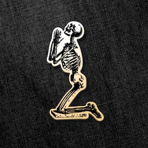 Prayers of the Abyss Enamel Pin, Skeleton Praying Pin, Gold Tone Black Enamel, Mystical Accessory, Unique Gift, Artistic Pin