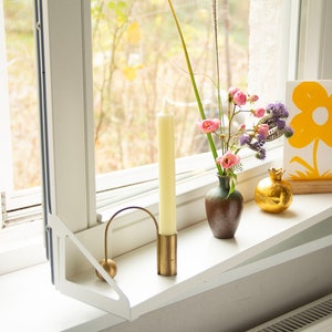 Movable window sill fresh air