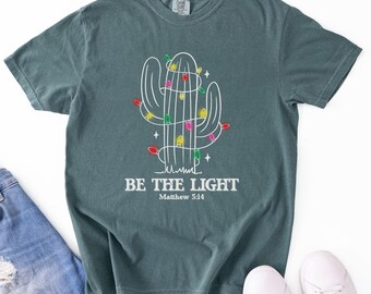 Comfort Colors Christian Shirt for Christmas Be The Light TShirt Religious Christmas Tee Bible Verse Shirt Cowboy Christmas Matthew 5:14
