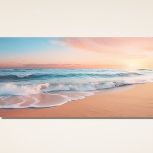 May include: A panoramic view of a sandy beach with foamy waves crashing on the shore. The sky is a vibrant mix of pink, orange, and blue, creating a beautiful sunset scene.