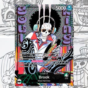 Könnte beinhalten: Eine Sammelkarte mit Brook von der Strohhut-Crew. Die Karte hat ein farbenfrohes Design mit einem Schädel-Charakter, der Kopfhörer und Sonnenbrille trägt. Die Karte enthält Text und einen Lebenszähler.