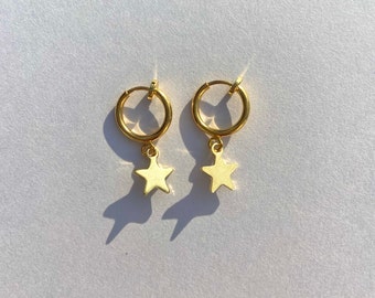 Pendientes de estrella dorada con clip