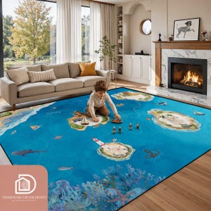 May include: A large, rectangular area rug with a vibrant blue ocean design featuring islands, a lighthouse, and marine life. The rug has a black border and is placed in a living room setting. A child is playing with toy boats and figures on the rug.