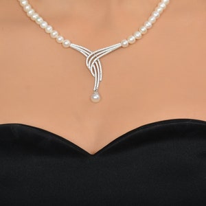 Schmuckset mit Kristallen: 4-teiliges Süsswasserperlen-Set in 925er Silber Perlenkette Perlenarmband Perlenohrringe & Perlenring Bild 3