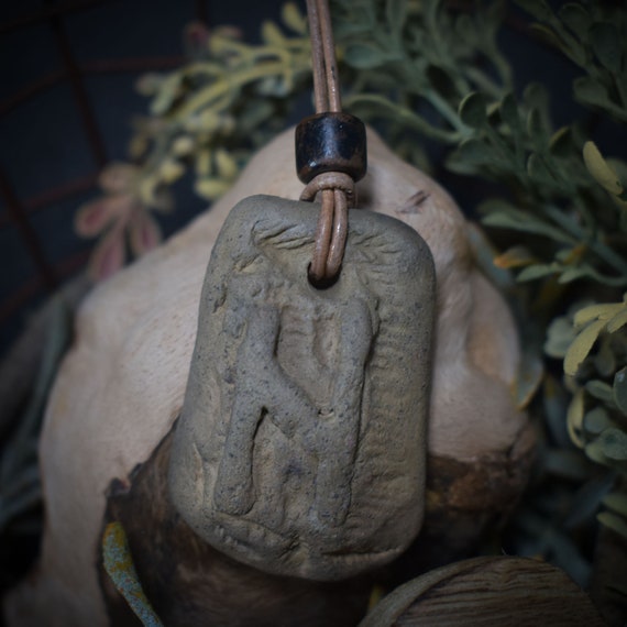 Handmade Futhark Rune Hagalaz amulet made of traditionally fired clay - Adjustable leather strap with pearl - Unique jewelry
