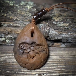 Bee amulet made of clay – an archaic art form made from traditionally fired clay - AMU069