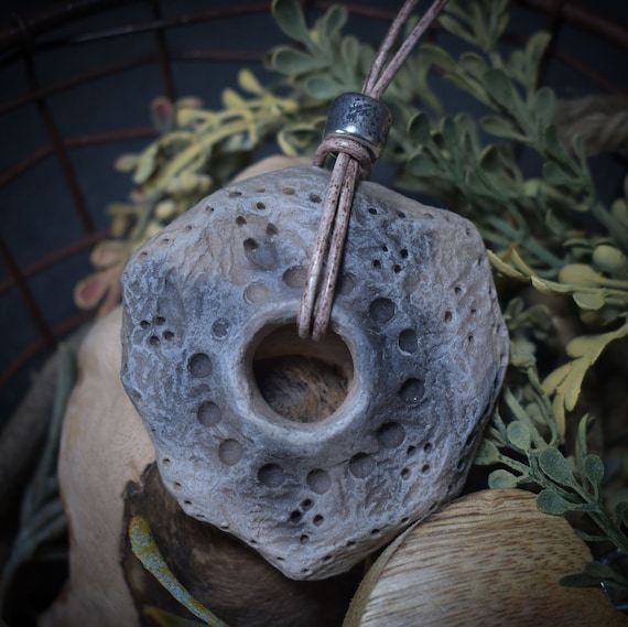 Handmade amulet talisman in donut shape made of rustic clay - unique smoke-fired artwork - with leather or cotton strap
