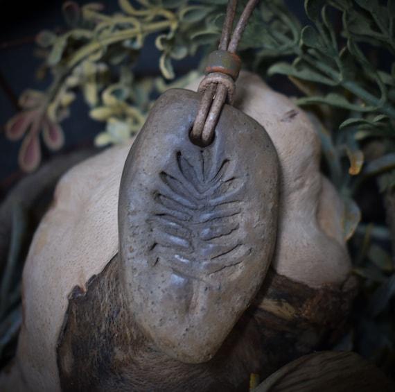 Unique amulet: Handmade smoke-fired clay talisman with fern symbol with leather or cotton strap