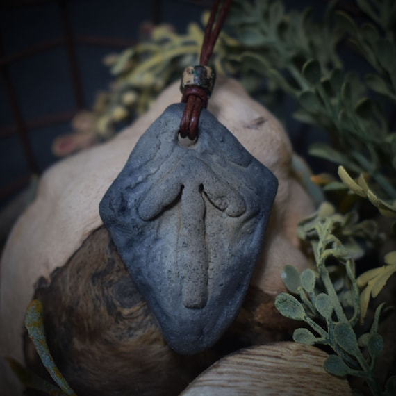 Handmade Futhark Rune Tiwaz amulet made of traditionally fired clay - Adjustable leather strap with pearl - Unique jewelry
