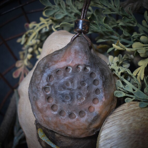 Handmade amulet - Nordic sun wheel - Traditional clay talisman for luck & prosperity - with leather or cotton strap