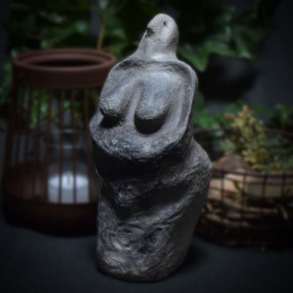Handmade traditional Venus figurine made of clay - talisman for pregnancy and desire to have children. Matriarchy, fertility goddess
