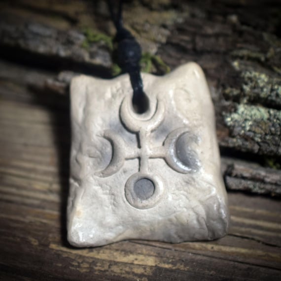 Hekate Amulet – Archaic smoke-fired clay art with adjustable cotton cord and glass bead – Item No.: AMU054