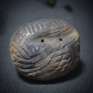 Traditionally fired clay rattle - Primal Sound of the Earth - Shamanic hand rattle made of smoke-fired clay - Item No.: SRA029