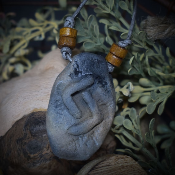 Handmade Futhark Rune Jera amulet made of traditionally fired clay - Adjustable leather strap with pearl - Unique jewelry