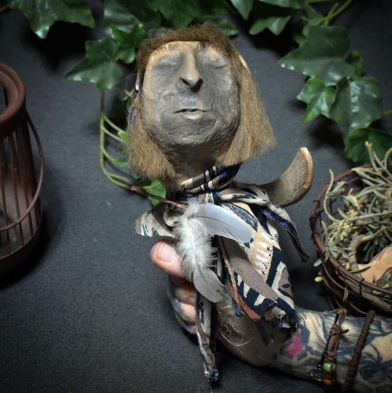 Spirit Doll "The Old Sound Wanderer" – Altar doll with clay head, wool, feathers and bell - Item No.: SDO017