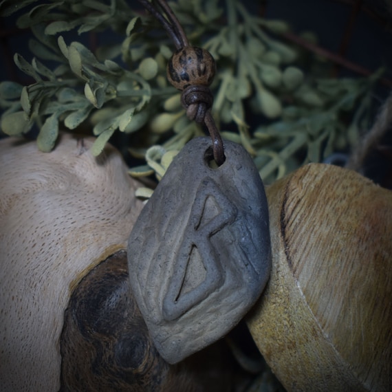 Handmade Futhark Rune Berkana amulet made of traditionally fired clay - Adjustable leather strap with pearl - Unique jewelry