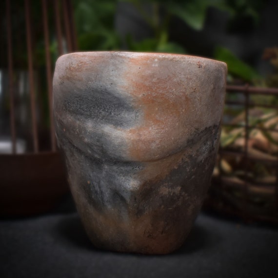 Planter female torso made of traditionally fired clay in a rustic ambience - ode to femininity