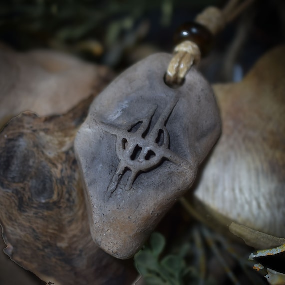 Handmade amulet made of traditionally fired clay with moon and star symbol - with leather or waxed cotton cord