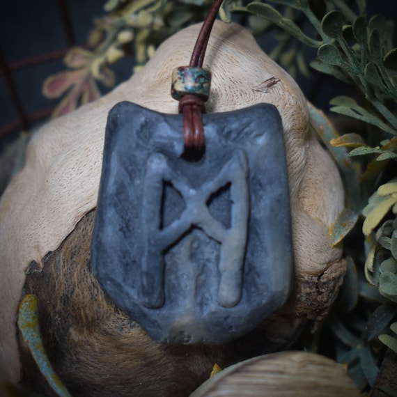 Handmade Futhark Rune Mannaz amulet made of traditionally fired clay - Adjustable leather strap with pearl - Unique jewelry