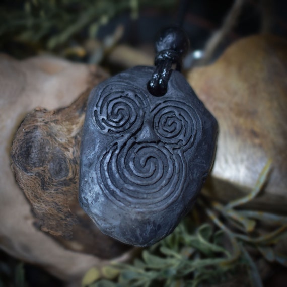 Handmade amulet - Newgrange - made of traditionally fired clay - with leather or cotton strap
