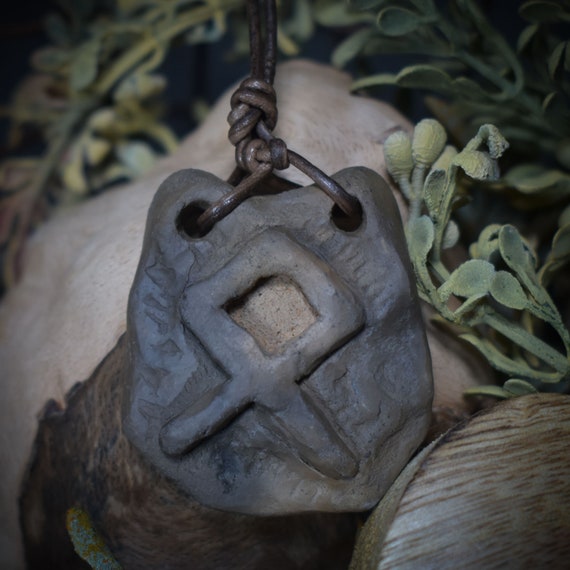 Handmade Futhark Rune Othala amulet made of traditionally fired clay - Adjustable leather strap - Unique jewelry