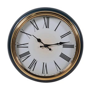 May include: A round wall clock featuring a dark blue outer frame and a metallic gold inner rim. The clock face is white with black Roman numerals and black spade-style hour and minute hands, along with a thin black second hand centred on the dial.