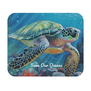 May include: A green sea turtle swims through blue water with coral reefs and rocks in the background. The turtle has a green shell with brown and yellow markings. The text "Save Our Oceans" is written in white below the turtle.