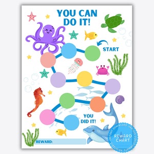 Może przedstawiać: Drukowana tabela nagród z motywem oceanu w niebiesko-zielono-pomarańczowej kolorystyce. Tabela zawiera ścieżkę z kółkami, które można kolorować, gdy dziecko wykonuje zadania. Tabela zawiera również obrazy stworzeń morskich, takich jak ośmiornica, konik morski, meduza, krab i żółw. Tekst "You Can Do It!" i "You Did It!" jest umieszczony na tabeli.