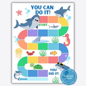 May include: A colorful printable reward chart featuring a shark theme. The chart has a path with various sea creatures and the text "You Can Do It!" and "You Did It!"