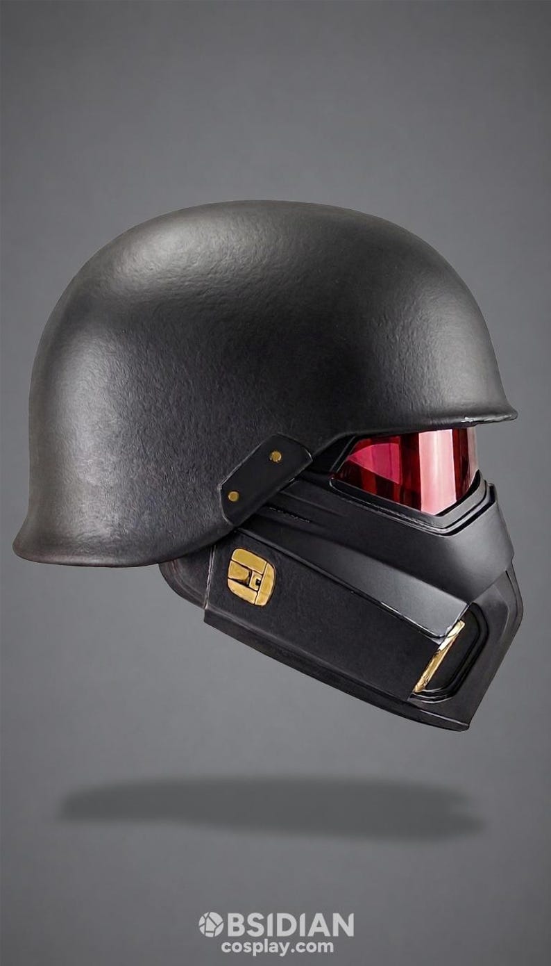 May include: A matte black tactical helmet featuring a smooth rounded dome, a lower face mask section, and a reflective red visor. The side of the mask displays a gold emblem, and the text OBSIDIAN cosplay.com is printed at the bottom center.