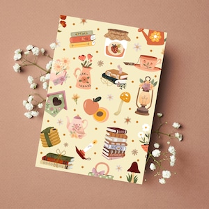 May include: A yellow background with a pattern of various illustrations including books, teapots, flowers, mushrooms, a birdhouse, a candle, a jar of jam, a lantern, and a teacup. The text "LOVE", "BIRDS", and "MYTHOLOGY" are visible on some of the books.