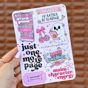 May include: A pink sticker sheet with various book-themed illustrations and text. Designs include a bookshelf, a ghost reading a book, cherries, and phrases like "I'd rather be reading" and "Books are my therapy."