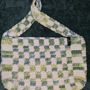 Green and white checkered purse.