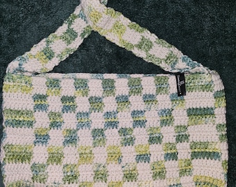 Green and white checkered purse.