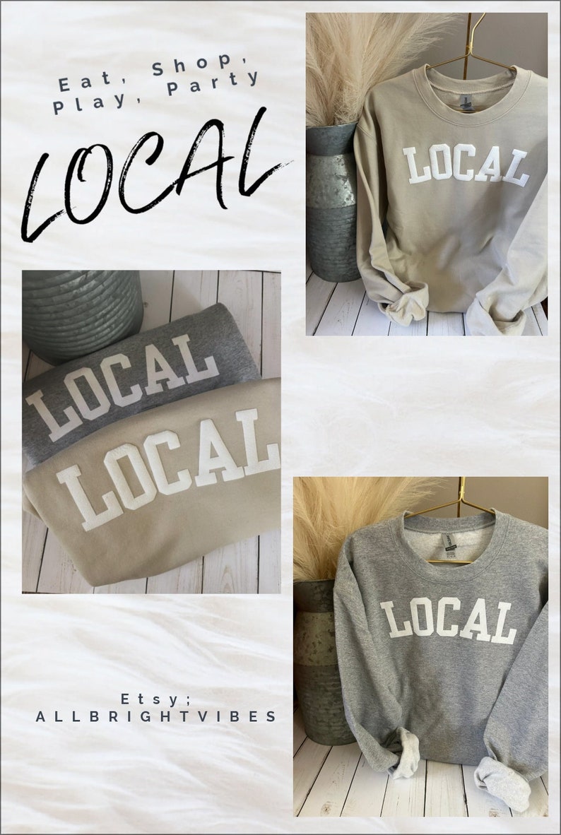 Puede incluir: Tres sudaderas con la palabra "LOCAL" impresa en blanco en la parte delantera. Las sudaderas son de tres colores diferentes: gris, beige y marr&oacute;n claro.